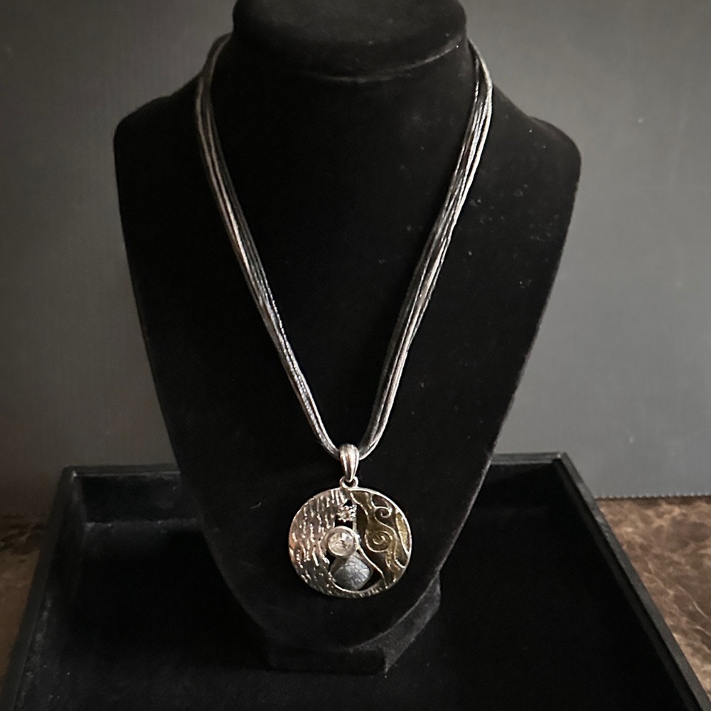 Elegant Silver and Gold Pendant Necklace